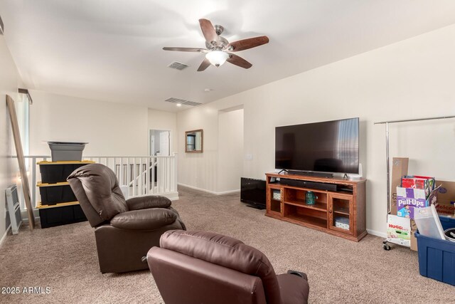 13123 W Cottontail Ln, Peoria, AZ 85383 - living area with carpet, ceiling fan, and baseboards