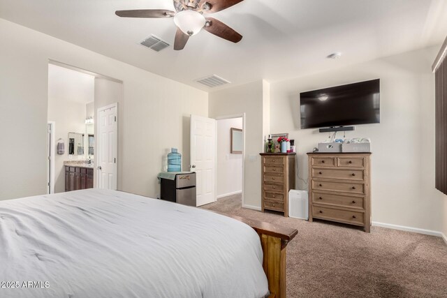 13123 W Cottontail Ln, Peoria, AZ 85383 - bedroom featuring carpet floors, baseboards, a ceiling fan, and ensuite bath