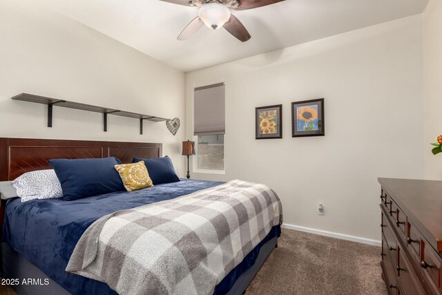 13123 W Cottontail Ln, Peoria, AZ 85383 - bedroom featuring dark carpet, baseboards, and ceiling fan