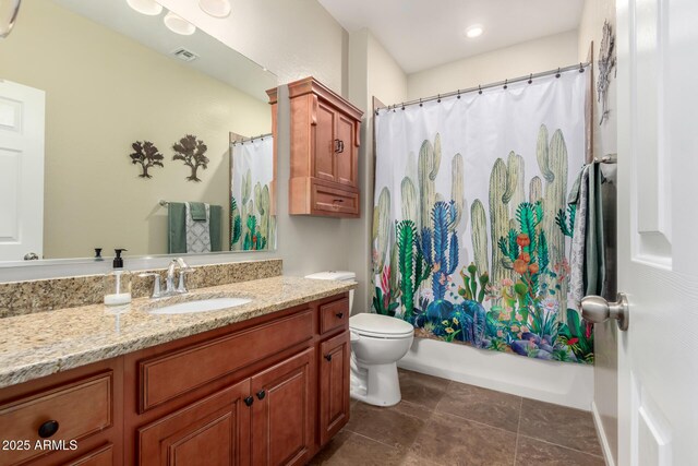 13123 W Cottontail Ln, Peoria, AZ 85383 - bathroom featuring vanity, toilet, shower / tub combo, and tile patterned flooring