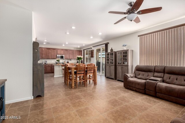 13123 W Cottontail Ln, Peoria, AZ 85383 - living area with ceiling fan, recessed lighting, and light tile patterned floors