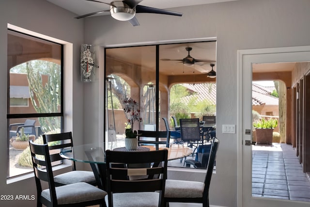 dining area with ceiling fan