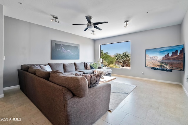 living room featuring ceiling fan