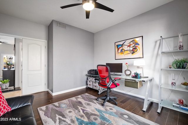 office featuring dark hardwood / wood-style floors and ceiling fan