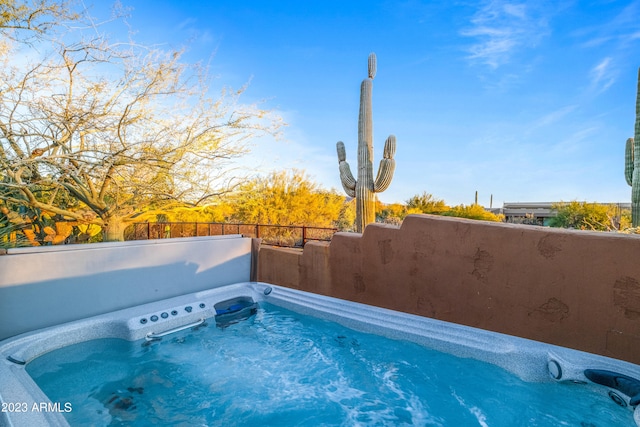 view of pool featuring a hot tub