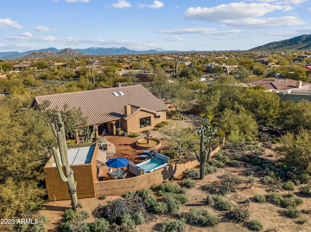 bird's eye view with a mountain view