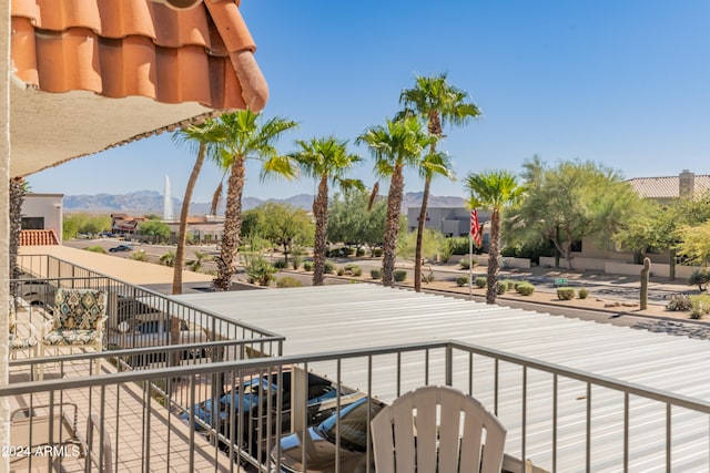 balcony featuring a mountain view