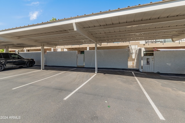 view of car parking with a carport