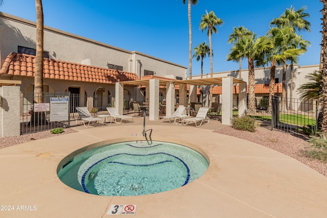 view of swimming pool featuring a patio area