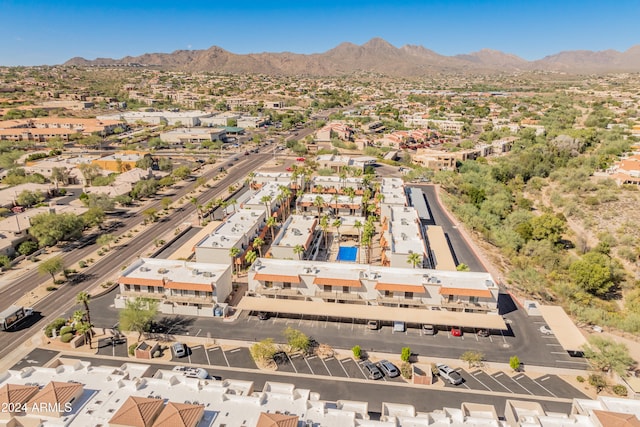 birds eye view of property with a mountain view