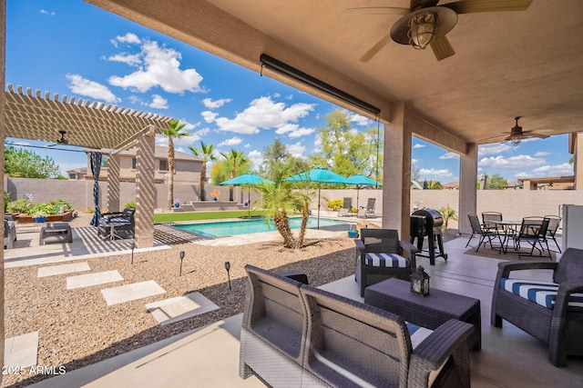 view of patio with a fenced backyard, ceiling fan, outdoor lounge area, and a pergola