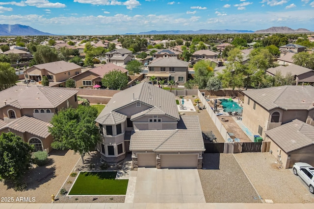 aerial view featuring a residential view and a mountain view