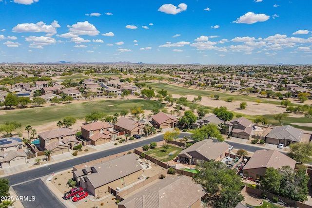 birds eye view of property featuring a mountain view, golf course view, and a residential view