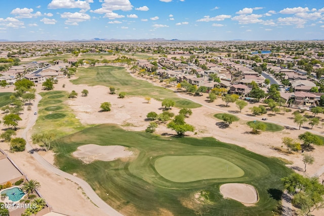 bird's eye view featuring view of golf course, a residential view, and a mountain view