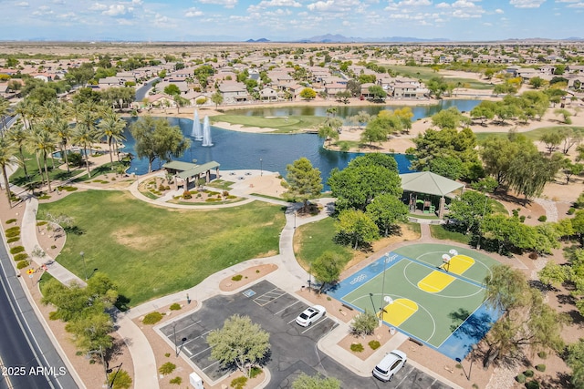 bird's eye view featuring a residential view and a water and mountain view