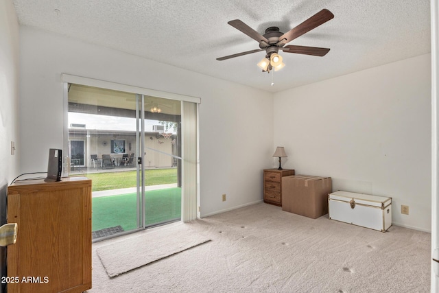 4501 E Carol Ave Unit 48, Mesa, AZ 85206 - empty room featuring a ceiling fan, carpet floors, a textured ceiling, and baseboards