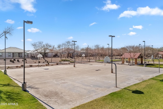 surrounding community featuring a residential view and community basketball court