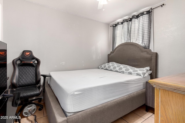 bedroom with light tile patterned flooring and ceiling fan