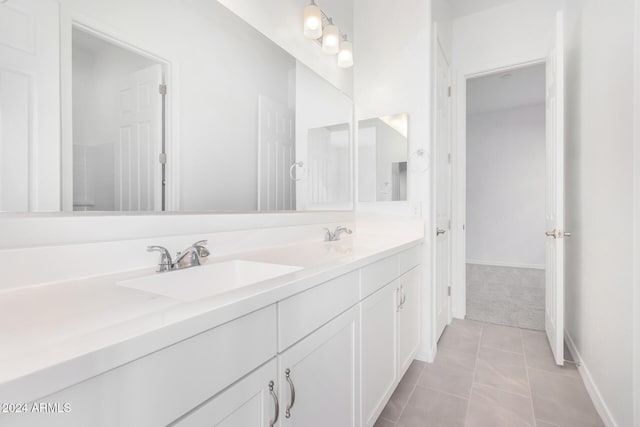 bathroom featuring vanity and tile patterned flooring