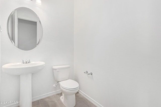 bathroom with sink and toilet