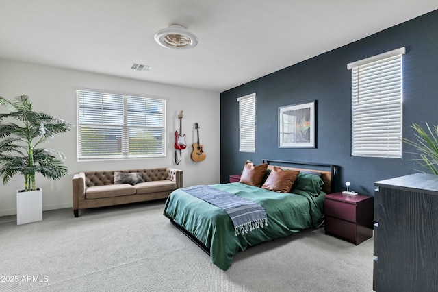 bedroom featuring visible vents and carpet floors