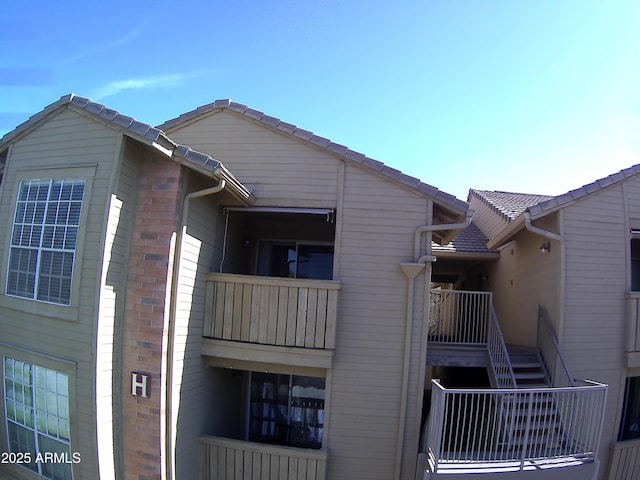 view of building exterior featuring stairway