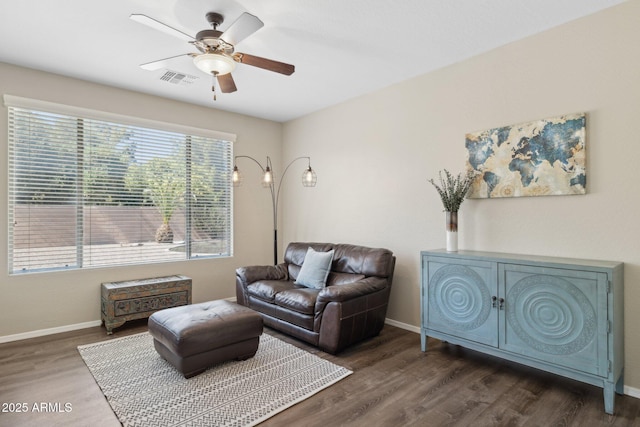 11048 E Quintana Ave, Mesa, AZ 85212 - sitting room featuring a ceiling fan, plenty of natural light, and wood finished floors