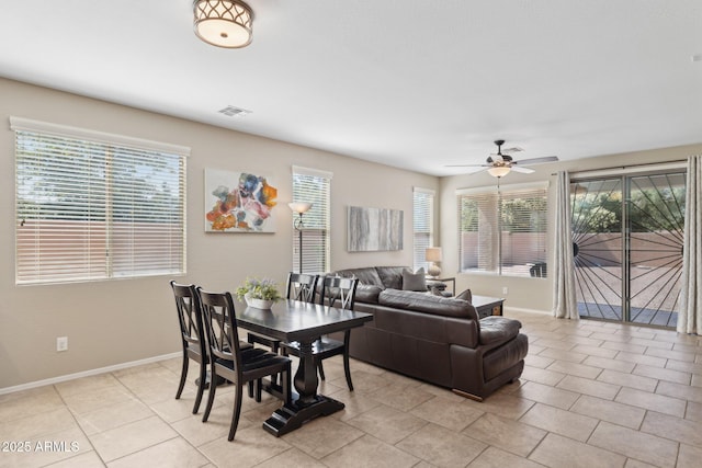 11048 E Quintana Ave, Mesa, AZ 85212 - dining area with ceiling fan and light tile patterned floors