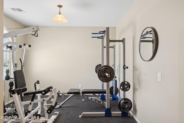 11048 E Quintana Ave, Mesa, AZ 85212 - exercise room featuring baseboards