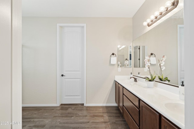11048 E Quintana Ave, Mesa, AZ 85212 - bathroom with double vanity and wood finished floors