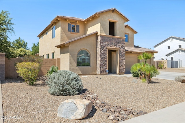 11048 E Quintana Ave, Mesa, AZ 85212 - mediterranean / spanish-style house with stucco siding, stone siding, a garage, and a tiled roof