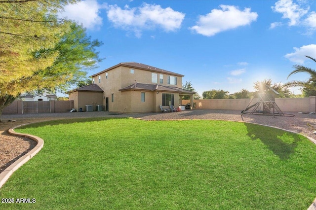 11048 E Quintana Ave, Mesa, AZ 85212 - rear view of house featuring a fenced backyard, stucco siding, and a patio area