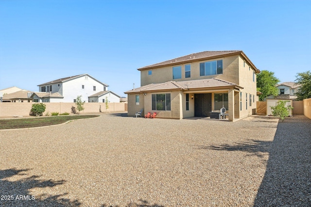 11048 E Quintana Ave, Mesa, AZ 85212 - rear view of property with a fenced backyard, a shed, stucco siding, and a tile roof