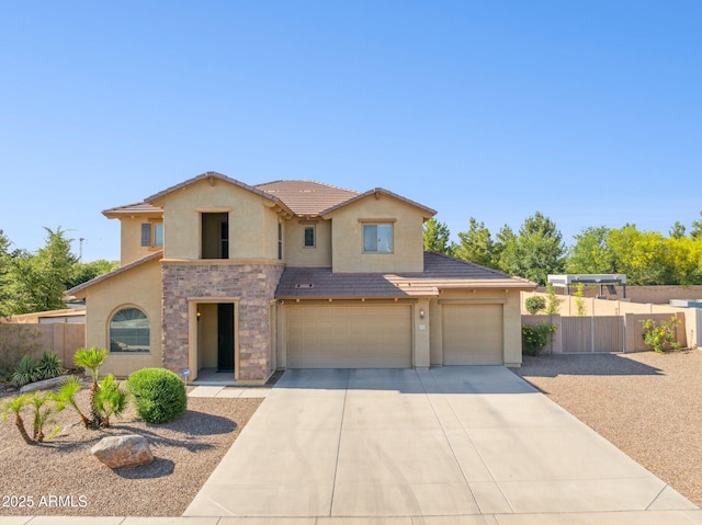 11048 E Quintana Ave, Mesa, AZ 85212 - mediterranean / spanish home featuring stucco siding, concrete driveway, a garage, stone siding, and a tile roof