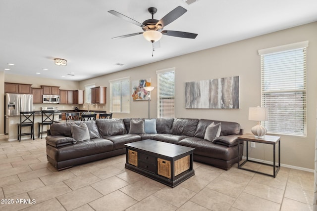 11048 E Quintana Ave, Mesa, AZ 85212 - living area featuring a ceiling fan, light tile patterned floors, and recessed lighting