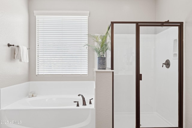 11048 E Quintana Ave, Mesa, AZ 85212 - bathroom featuring a stall shower and a garden tub