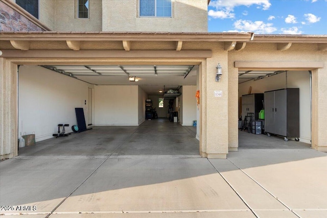 11048 E Quintana Ave, Mesa, AZ 85212 - garage with driveway and a garage door opener