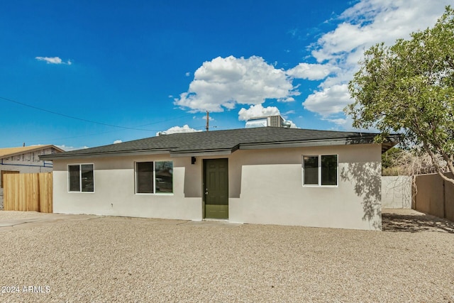 rear view of property featuring a patio