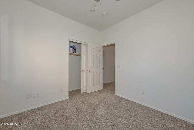 unfurnished bedroom with carpet and ceiling fan