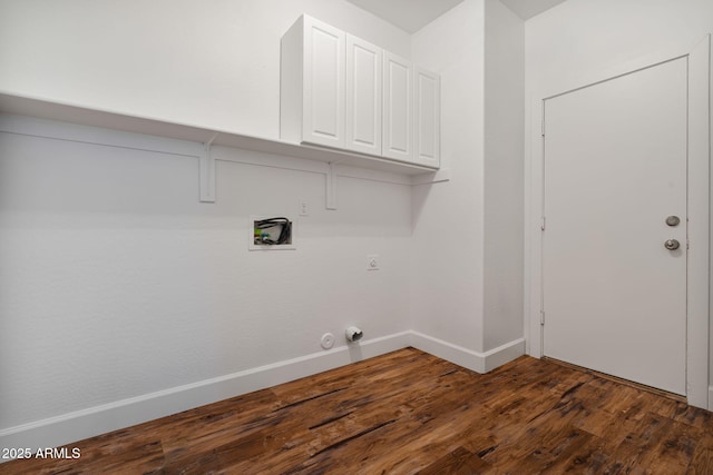 clothes washing area with dark wood-type flooring, cabinets, washer hookup, hookup for an electric dryer, and hookup for a gas dryer