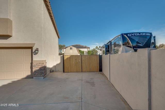 view of patio with a garage