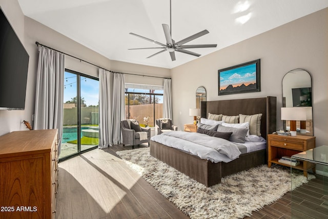 bedroom with access to exterior, hardwood / wood-style flooring, and ceiling fan