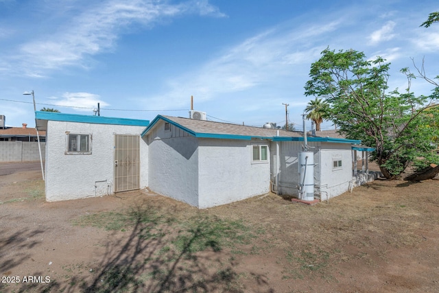 721 W Cinnabar Ave, Phoenix, AZ 85021 - rear view of property featuring stucco siding