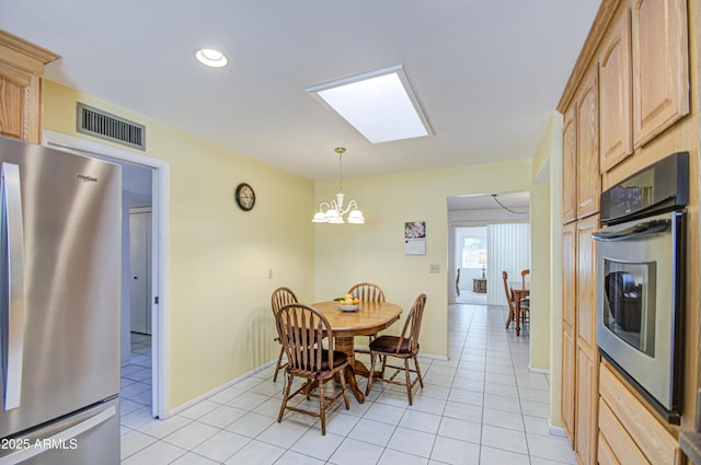 dining space with visible vents, a chandelier, baseboards, recessed lighting, and light tile patterned floors