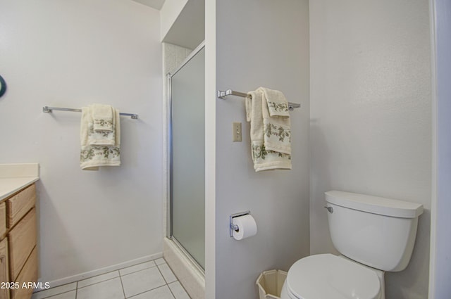 full bathroom with an enclosed shower, toilet, tile patterned floors, and vanity