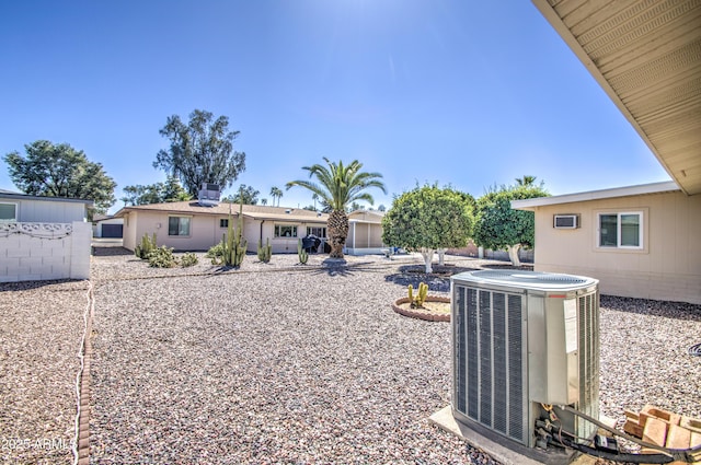view of yard with central air condition unit