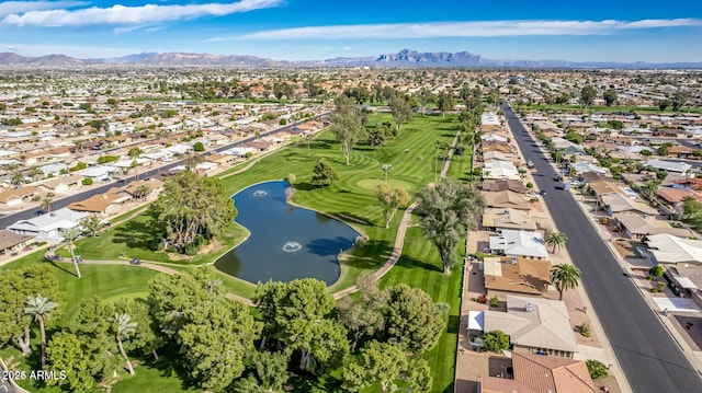 bird's eye view with a residential view, golf course view, and a water and mountain view