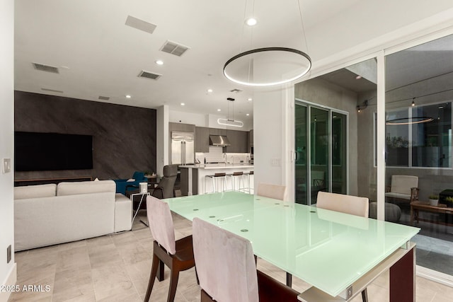 dining room featuring recessed lighting and visible vents