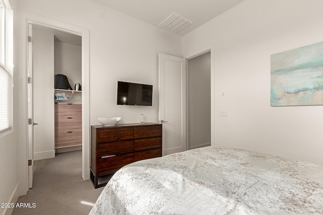 bedroom featuring visible vents and carpet floors