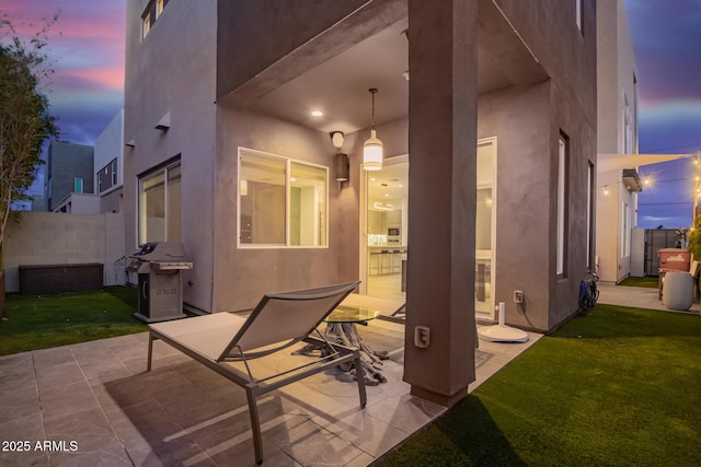 view of patio / terrace with fence and grilling area